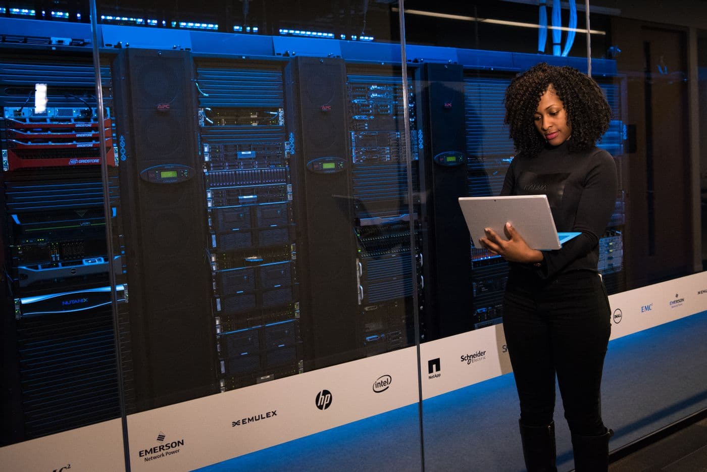 Racked servers with status lights in a data centre
